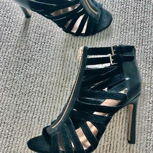 Black gladiator’s heels. Like new. Size 7